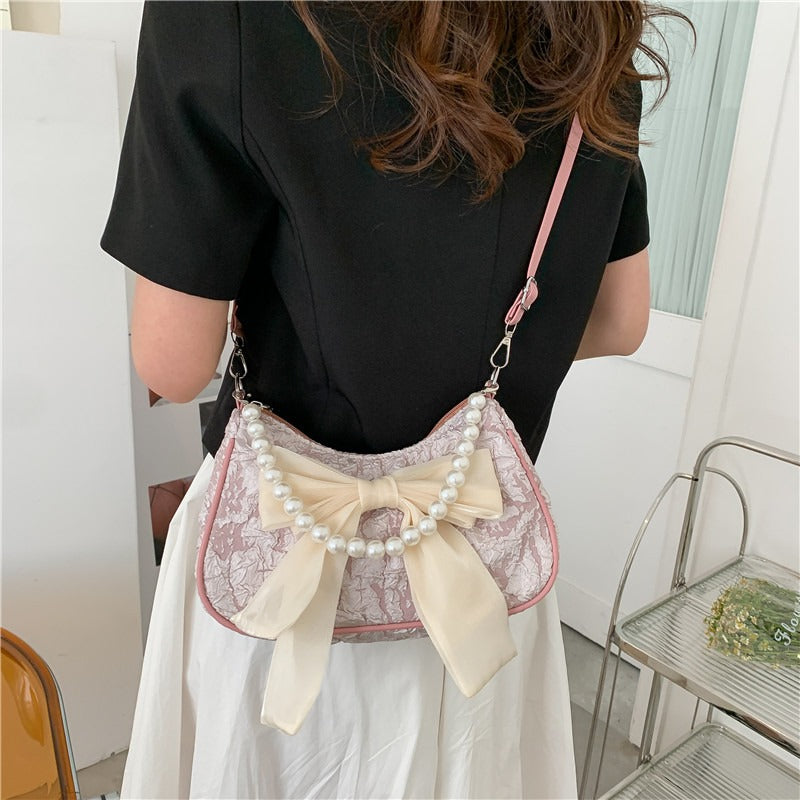 Wholesale Retro Bowknot Fashion Pearl Underarm Shoulder Crossbody Bag