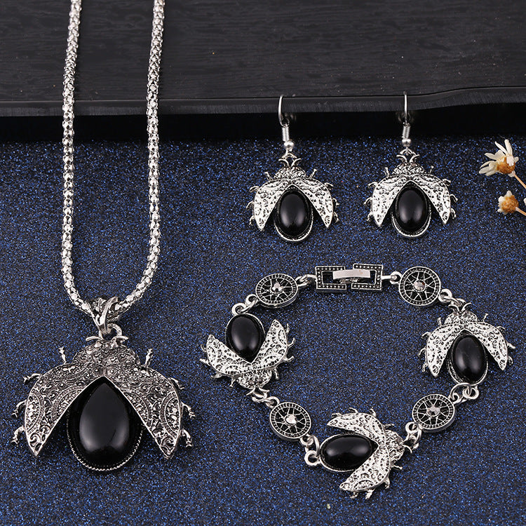 Wholesale Seven Star Ladybug Three Piece Alloy Earrings