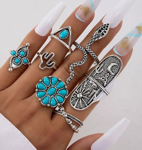 Vintage 8-piece Ring Set with Turquoise Carved Feathers