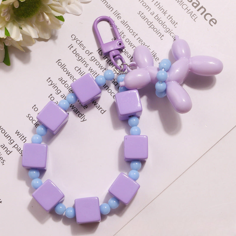 Wholesale Acrylic Rice Beads Bubble Dog Doll Keychain