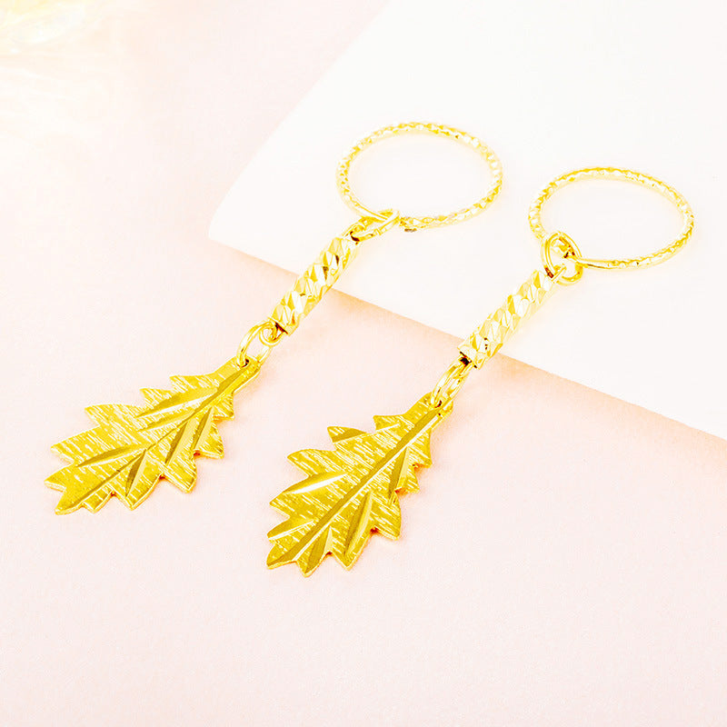 Wholesale Gold-plated long gold leaf tassel earrings