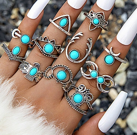Vintage 8-piece Ring Set with Turquoise Carved Feathers