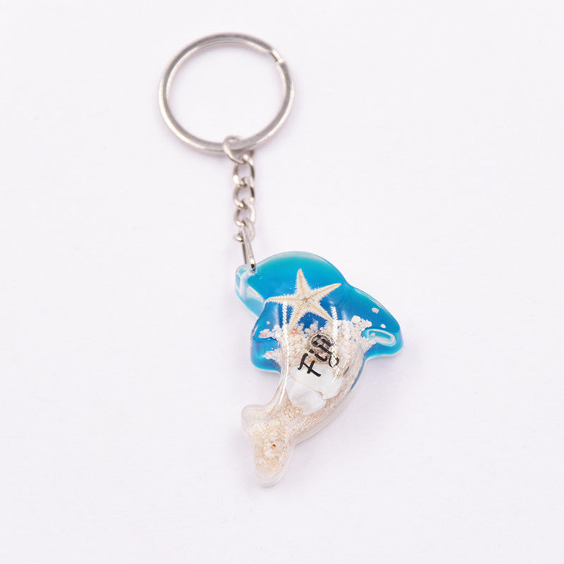 Mayorista 6pcs/paquete de resina Luminoso Stone Starfish Keychain