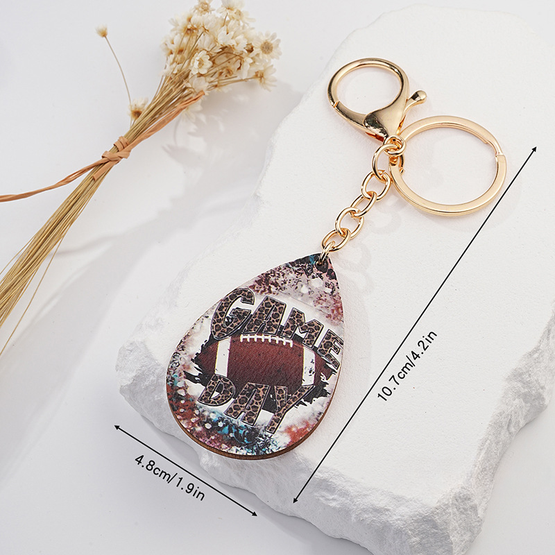Llavero de fútbol de leopardo de metal al por mayor