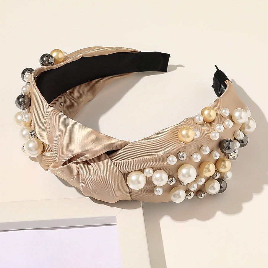 Wholesale of New Pearl Knotted Wide Edged PU Hair Bands