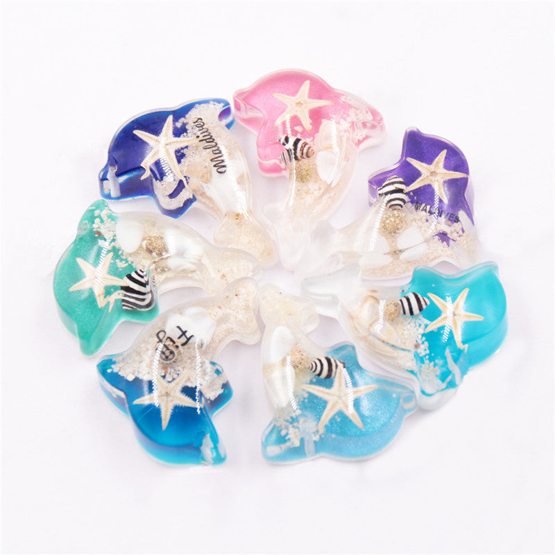Mayorista 6pcs/paquete de resina Luminoso Stone Starfish Keychain