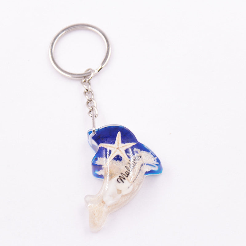 Mayorista 6pcs/paquete de resina Luminoso Stone Starfish Keychain