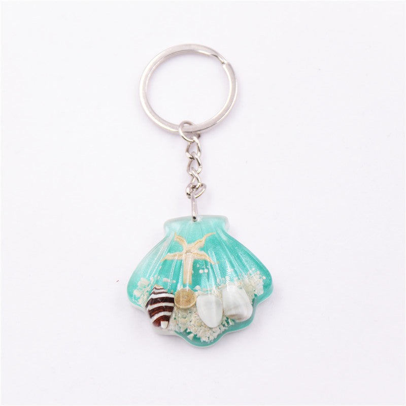 Al por mayor 6 piezas/paquete de llavero de estrella marina de la carcasa de la carcasa de resina