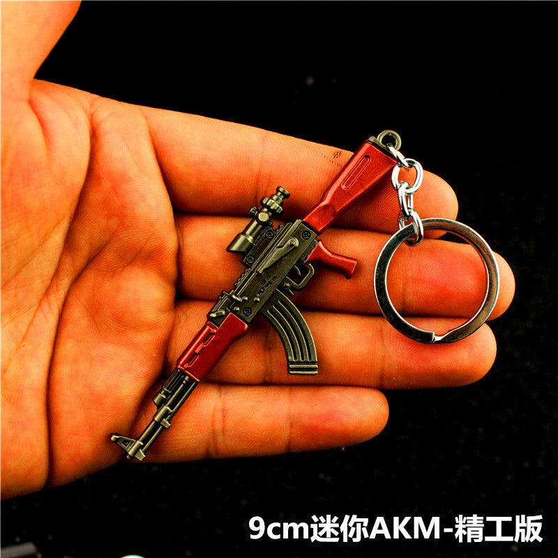 Wholesale  Helmet Flat Bottom Pot Backpack Signal Small Gun Keychain Metal Crafts Office Culture