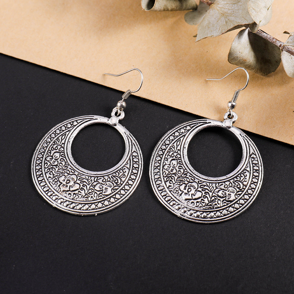 Wholesale Retro ethnic style totem pattern round hollow earrings