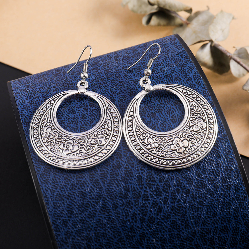 Wholesale Retro ethnic style totem pattern round hollow earrings