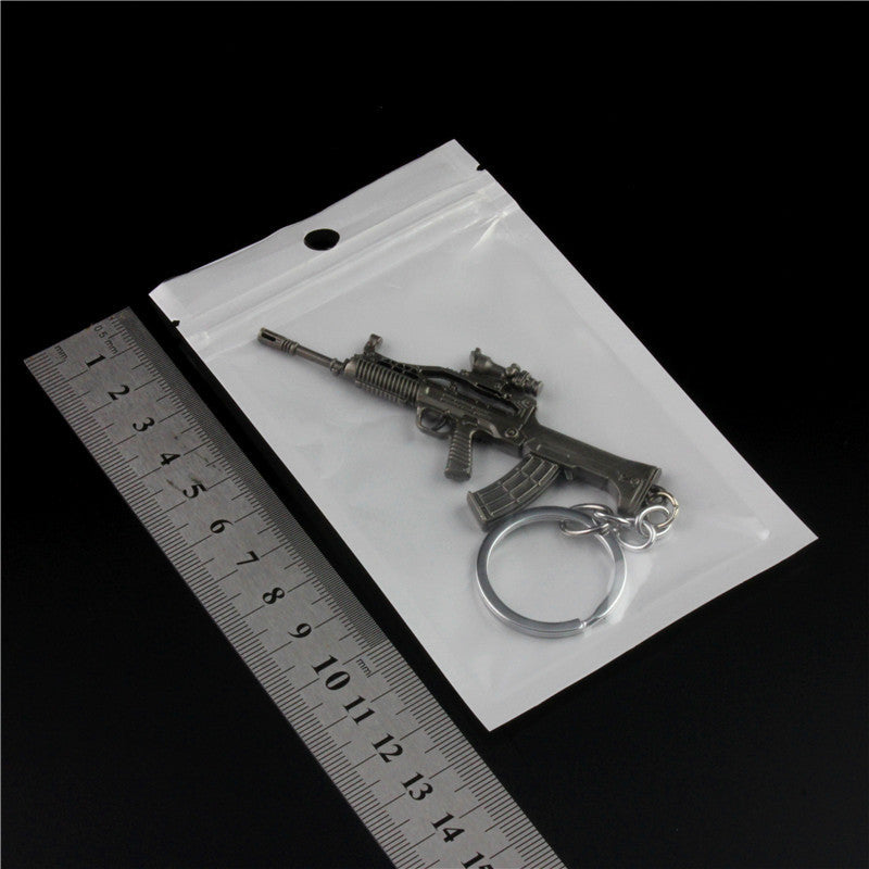 Wholesale  Helmet Flat Bottom Pot Backpack Signal Small Gun Keychain Metal Crafts Office Culture