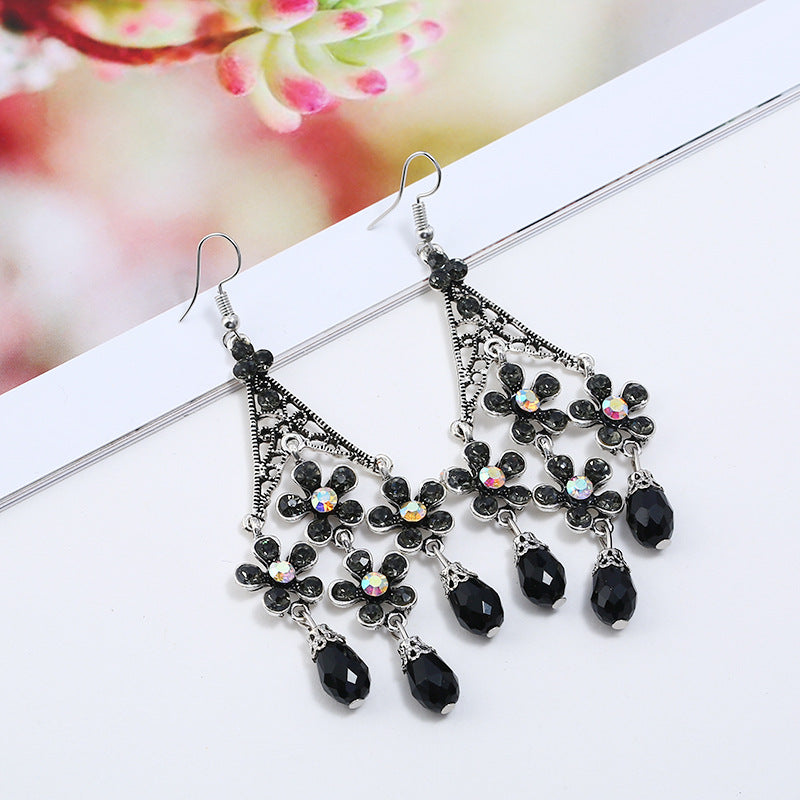 Wholesale Bohemian Retro Tassel Exaggerated Hollow Long Floral Crystal Earrings