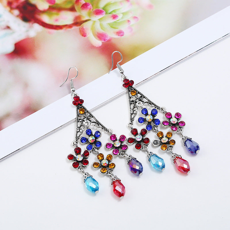 Wholesale Bohemian Retro Tassel Exaggerated Hollow Long Floral Crystal Earrings