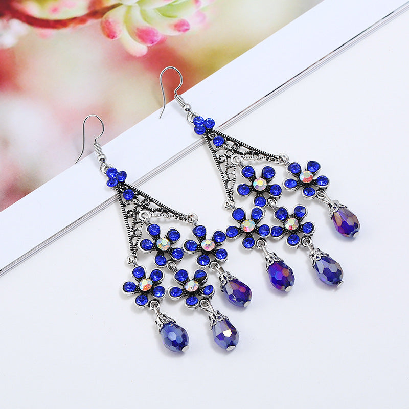 Wholesale Bohemian Retro Tassel Exaggerated Hollow Long Floral Crystal Earrings