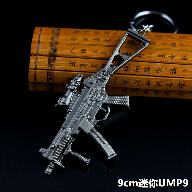 Wholesale  Helmet Flat Bottom Pot Backpack Signal Small Gun Keychain Metal Crafts Office Culture