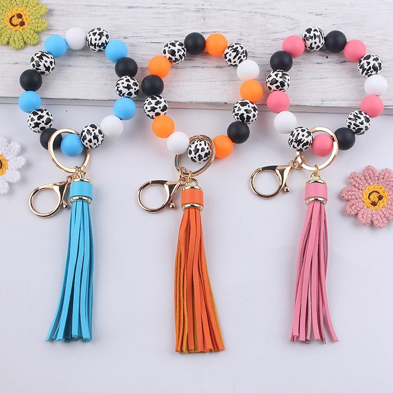 Wholesale Leather Tassel Silicone Beads Wooden Beads Bracelet Keychain