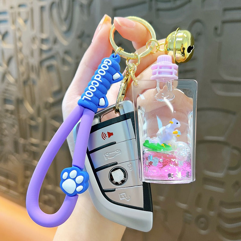 Wholesale Oil Filled Dinosaur Jelly Bottle Cute Liquid Quicksand Pendant Keychain