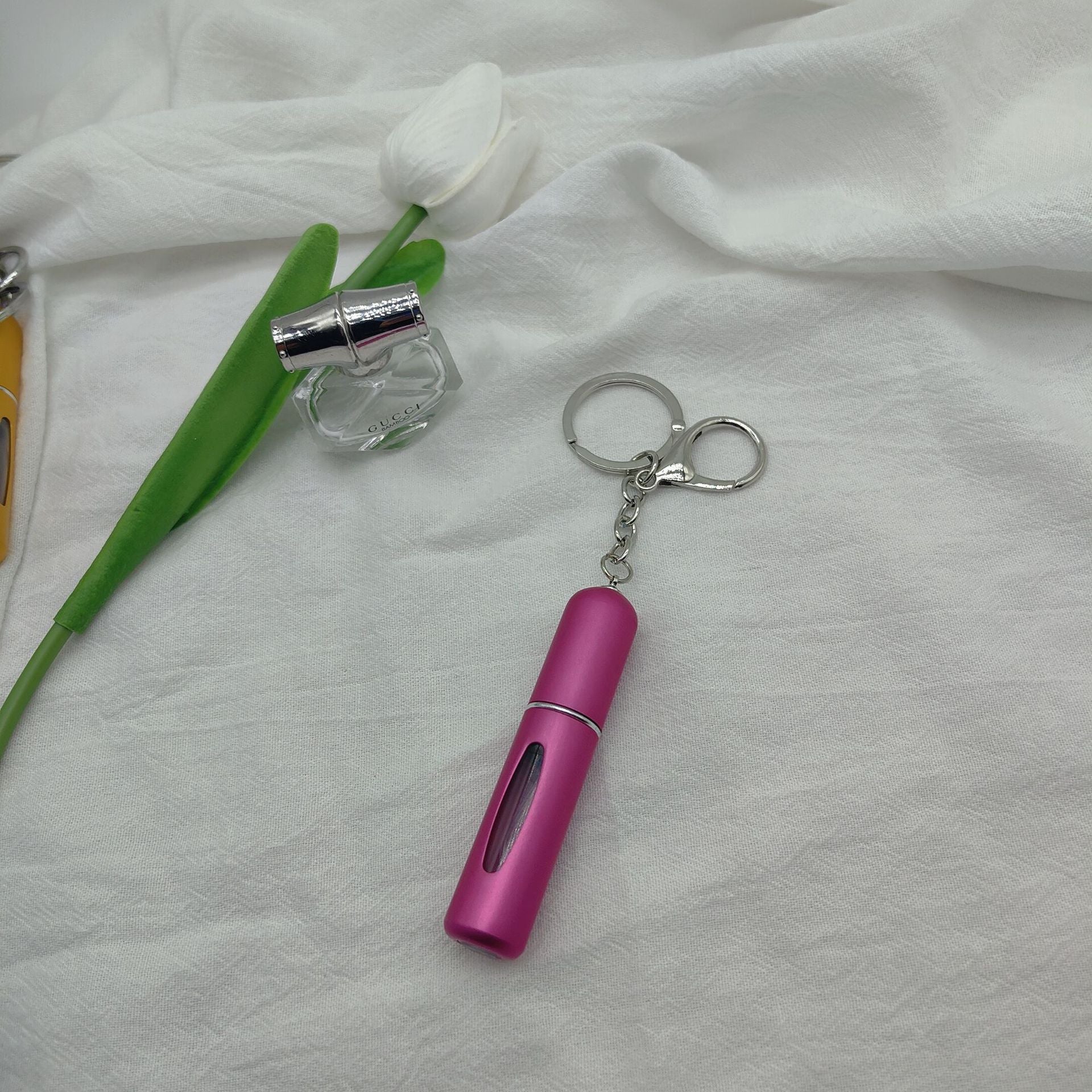 Wholesale bottom filling pump 5ml high color value sample key chain perfume bottle