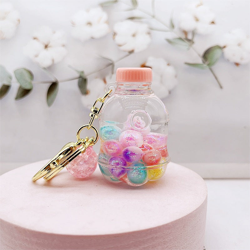 Botella de deriva acrílica al por mayor cuentas coloridas de botella y cadena de llave de botella