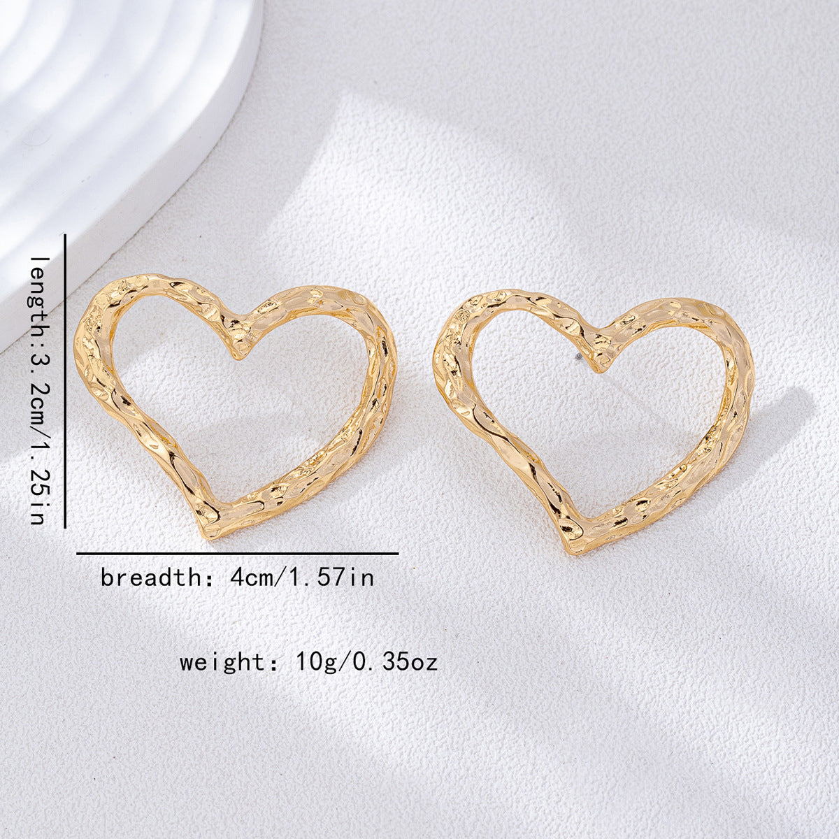 Wholesale Gold metal electroplated heart-shaped earrings