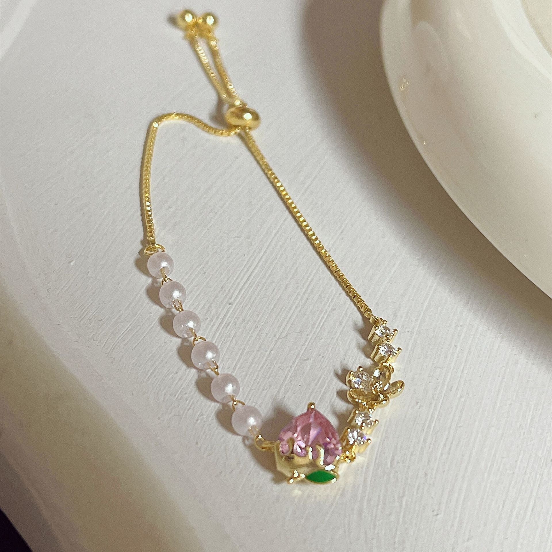 Wholesale Sweet Pink Strawberry Zircon Flower Pearl Metal Bracelet