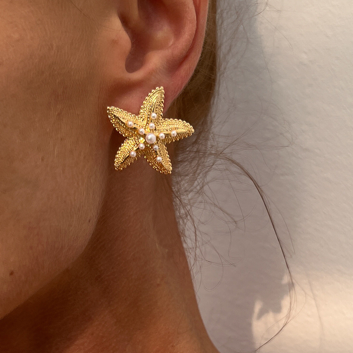 Wholesale Exaggerated conch and starfish earrings