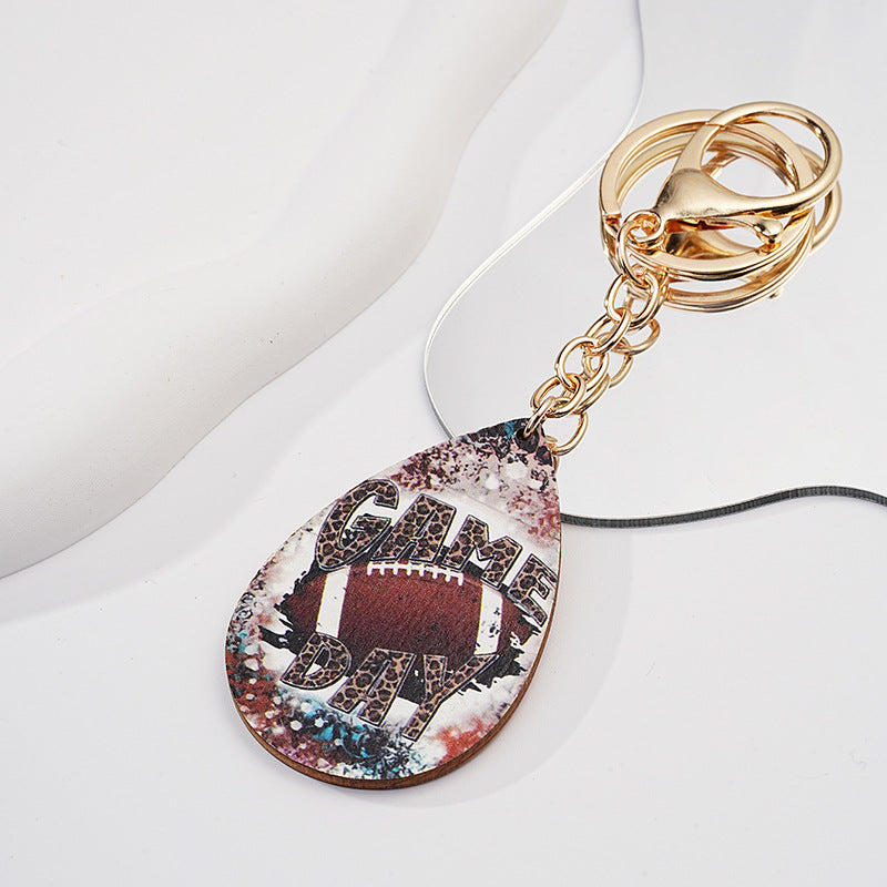 Llavero de fútbol de leopardo de metal al por mayor