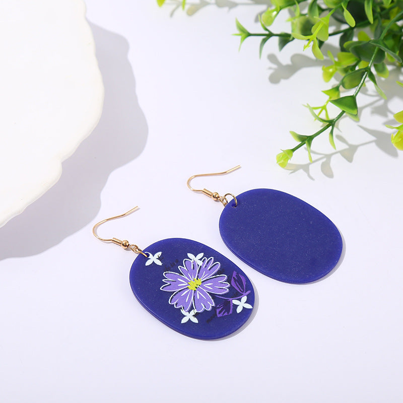 Pendientes de flores de margaritas de color púrpura acrílico al por mayor