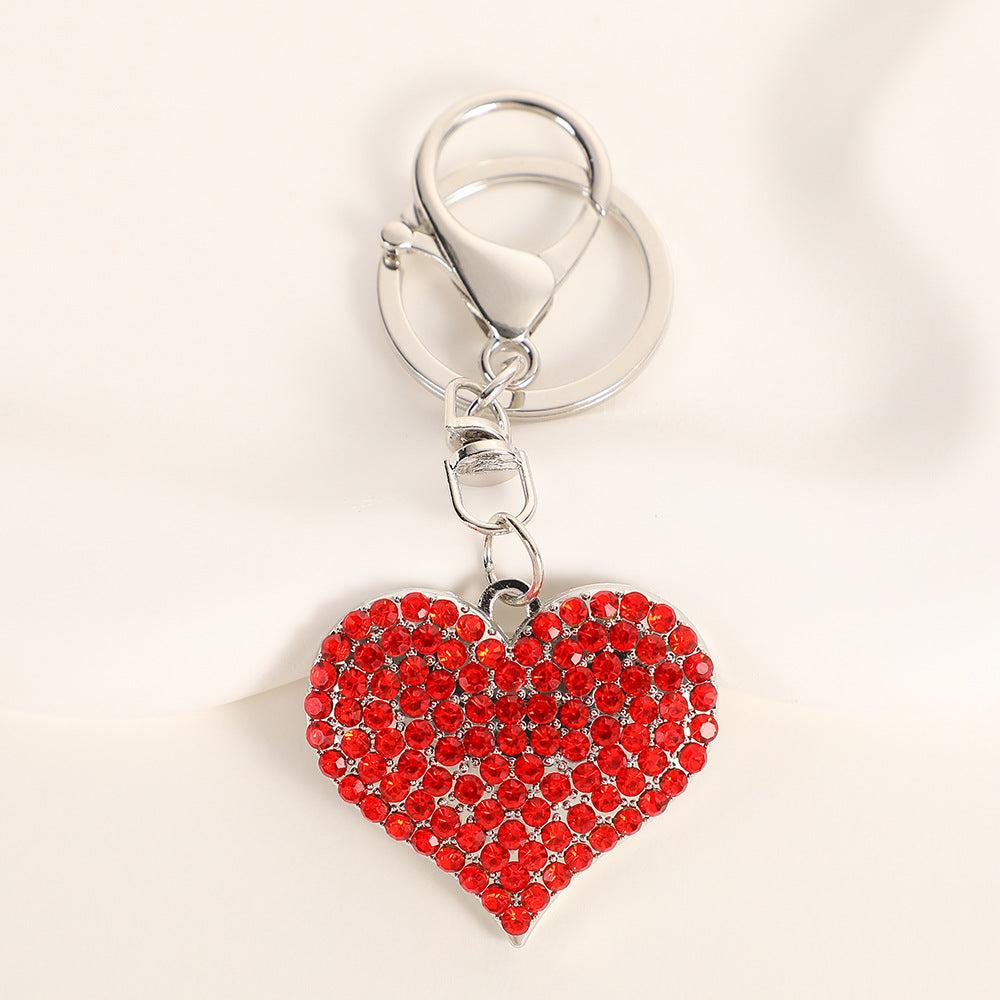 Wholesale Solid color peach heart set with diamonds Metal Keychain