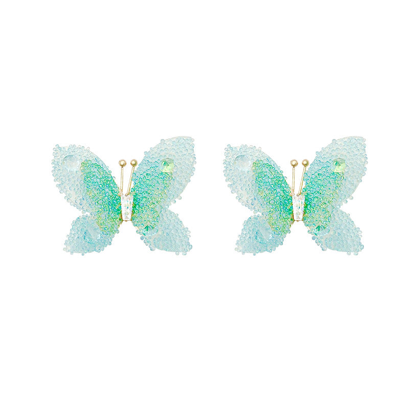 Pendientes de resina de mariposa al por mayor 925