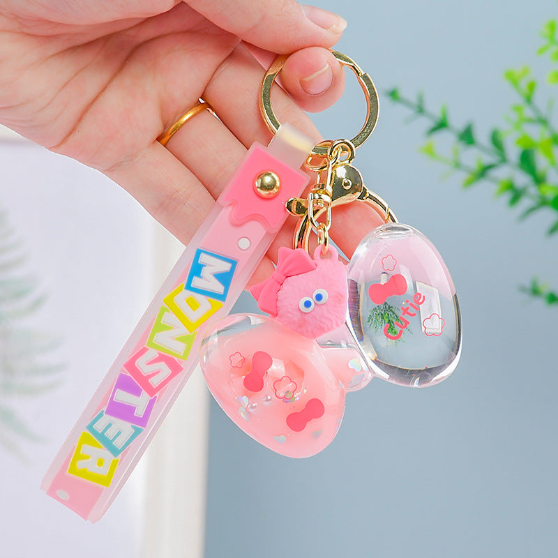 Wholesale PVC Liquid Into The Oil Bow Cartoon Keychain
