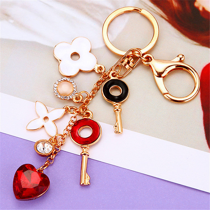 Wholesale Flower Metal Car Keychain With Tassel Pink White Bag Charm And Key Accessory Gift For Women Boutique Resale