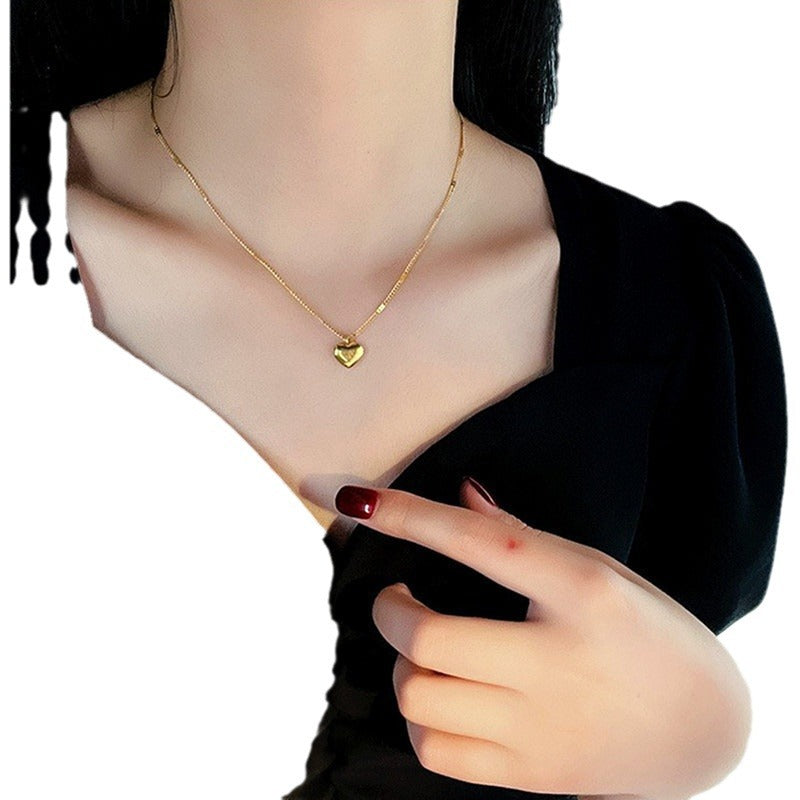 Wholesale Golden engraved love heart peach necklace