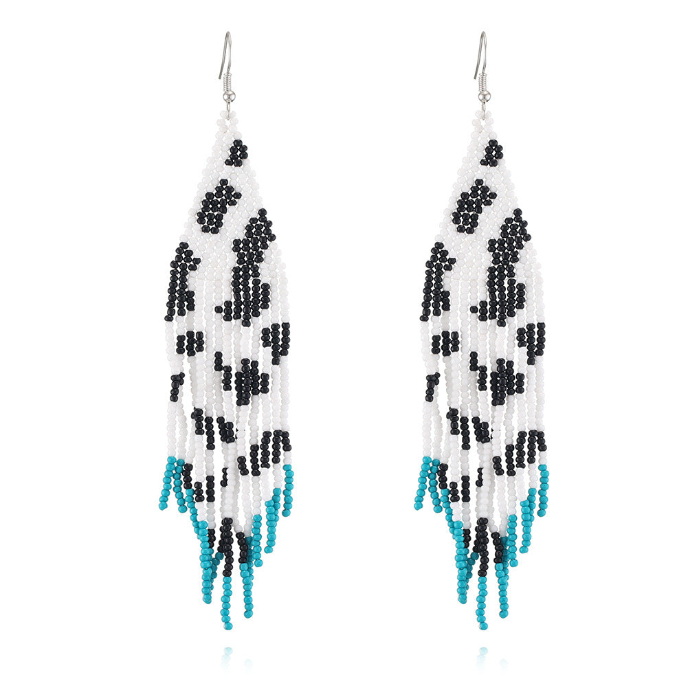 Wholesale Bohemian Rice Beads Handwoven Cow Pattern Long Tassel Earrings