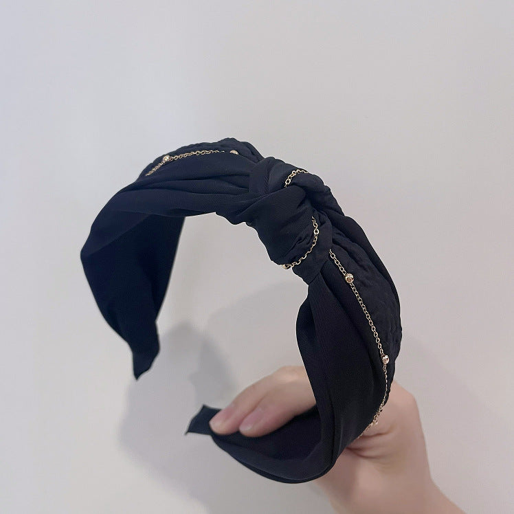 Wholesale   Light luxury high Skull top headband female high-end hairpin knotted wide edge hair pressing headband  face