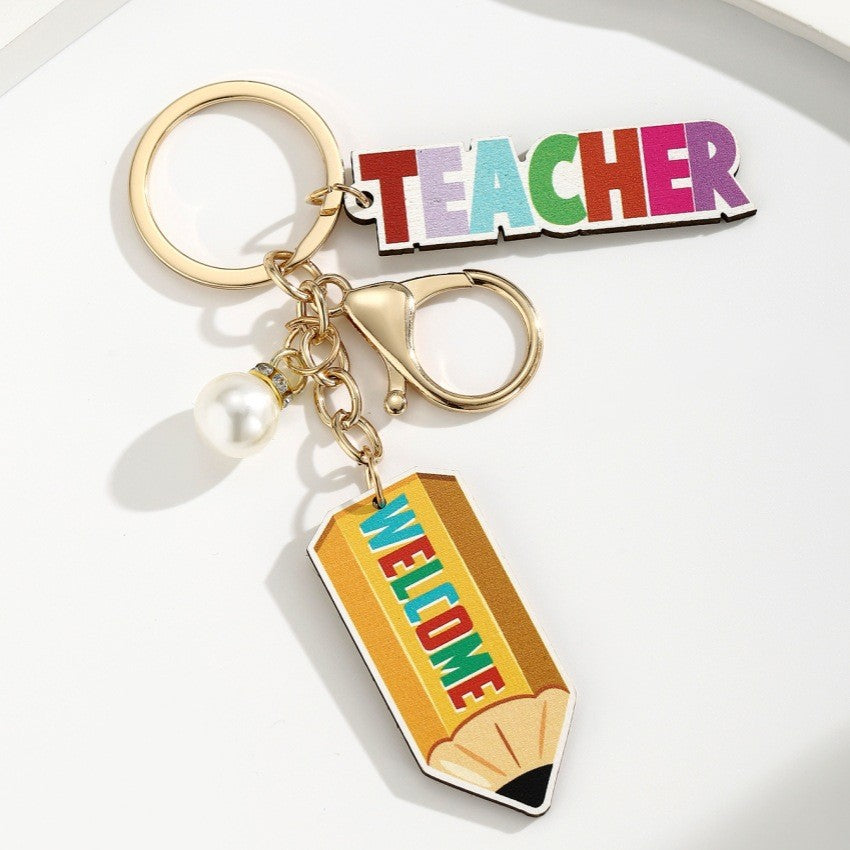 Wholesale Campus style graduation season wooden book keychain