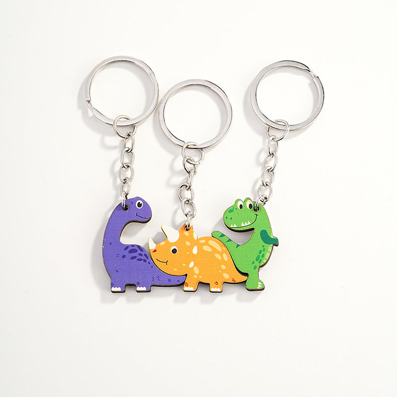 Wholesale of Three Cute Little Dinosaur Wooden Parent-child Keychains
