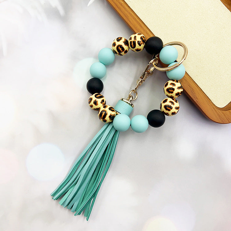 Wholesale Leopard Print Wood Beads Silicone Beaded Bracelet Tassel Key Ring