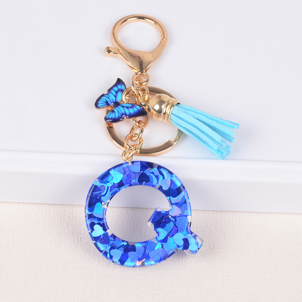 卸売ブルーラブバタフライタッセルレター樹脂キーホルダー