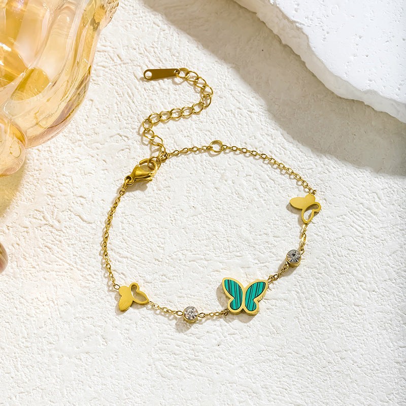 Wholesale Hollow out Fritillaria butterfly diamond titanium steel bracelet