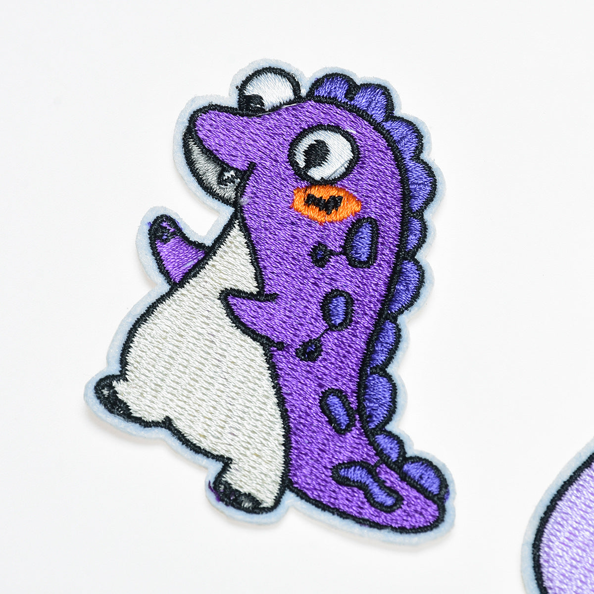 Wholesale Stylish Dinosaur Twill Embroidered Patch Iron On Applique For DIY Clothing And Bag Decoration