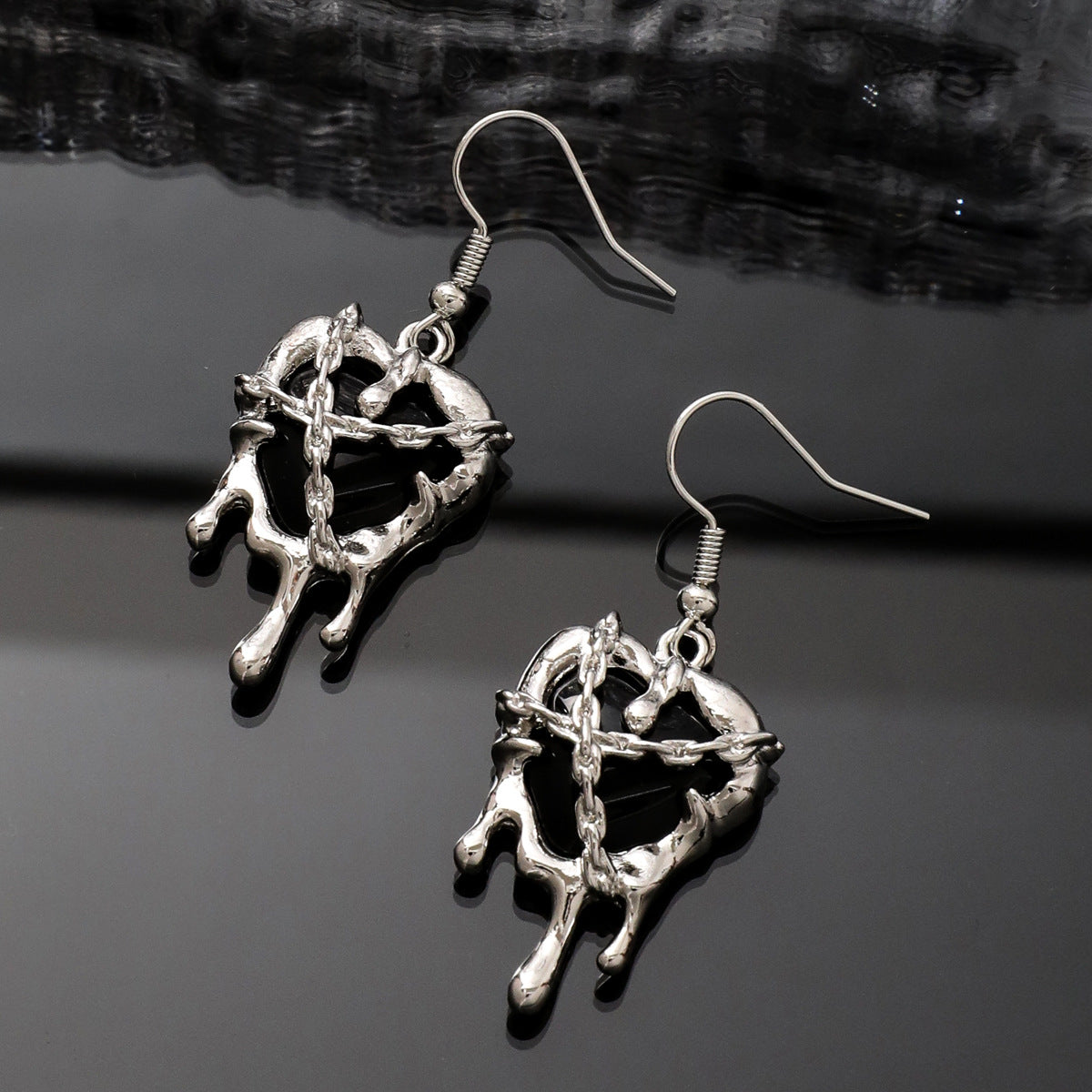 Wholesale Confined Heart Lava Heart Blood Punk Alloy Earrings