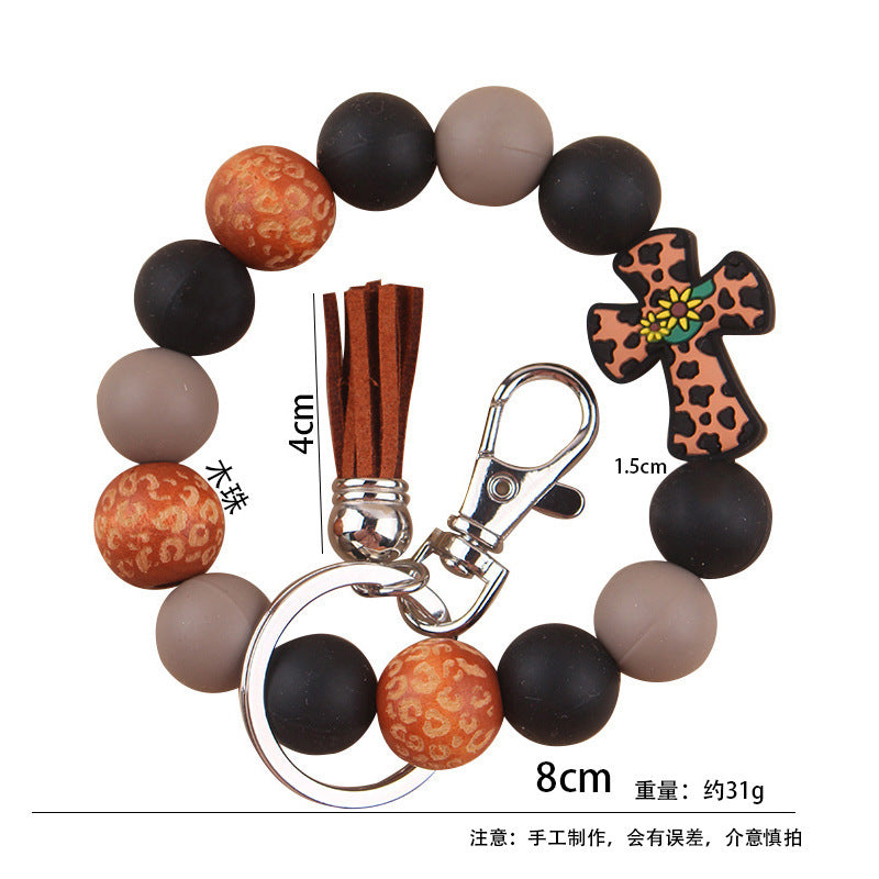Wholesale Silicone Leather Wooden Beads Tassel Print Leopard Bracelet Keychain