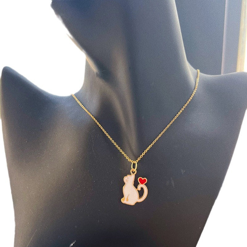 Wholesale Black and white cute heart-shaped cat earrings