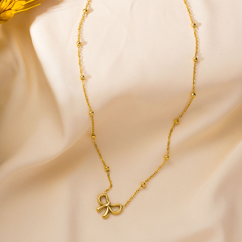 Wholesale titanium steel necklace gold luxury creative bow necklace