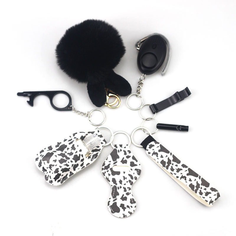 Wholesale Outdoor Whistle Hand Sanitizer Leather Case Fur Ball Key Chain Set