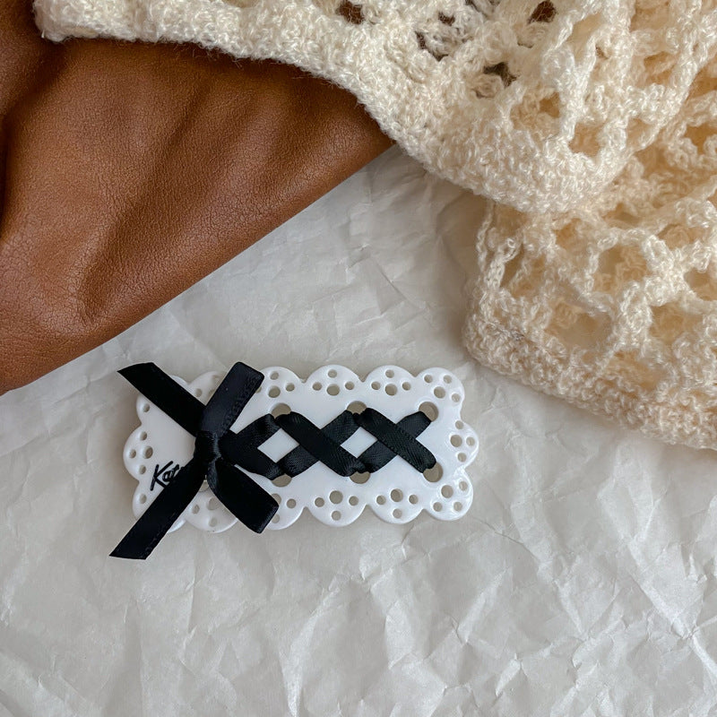 Wholesale Sweet and Cool Bow Hollow Letter Clip