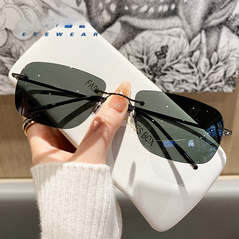 Wholesale Fashionable ultra-light high-end frameless trimmed sunglasses