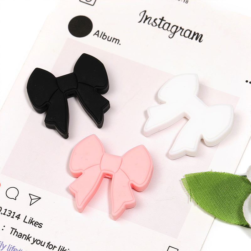 Wholesale 20pcs Bow Silicone Beads Fashionable Simple Rubber Beads